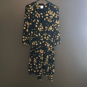 Cabi long sleeve dress. Black with yellow and purple flowers.